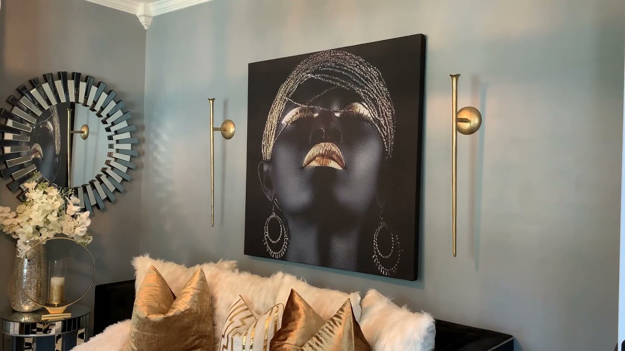 Chic black and gold formal living room.