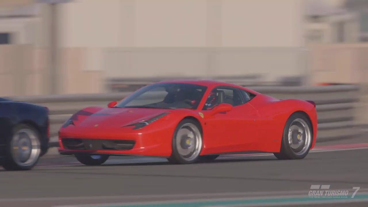 Ferrari 458 Italia ’09 Fights Through a Ferrari Grid Under the Yas Marina Sun