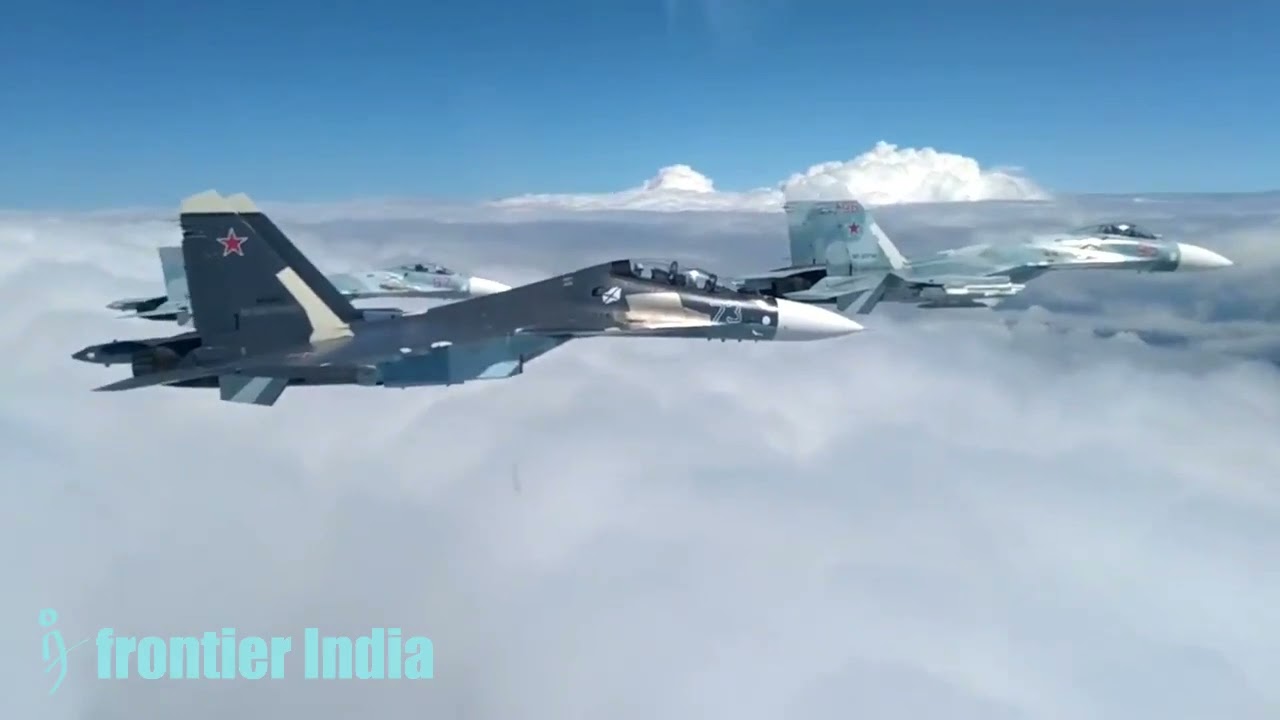 Russian Flankers and Kamov AEW Helicopters in flight.