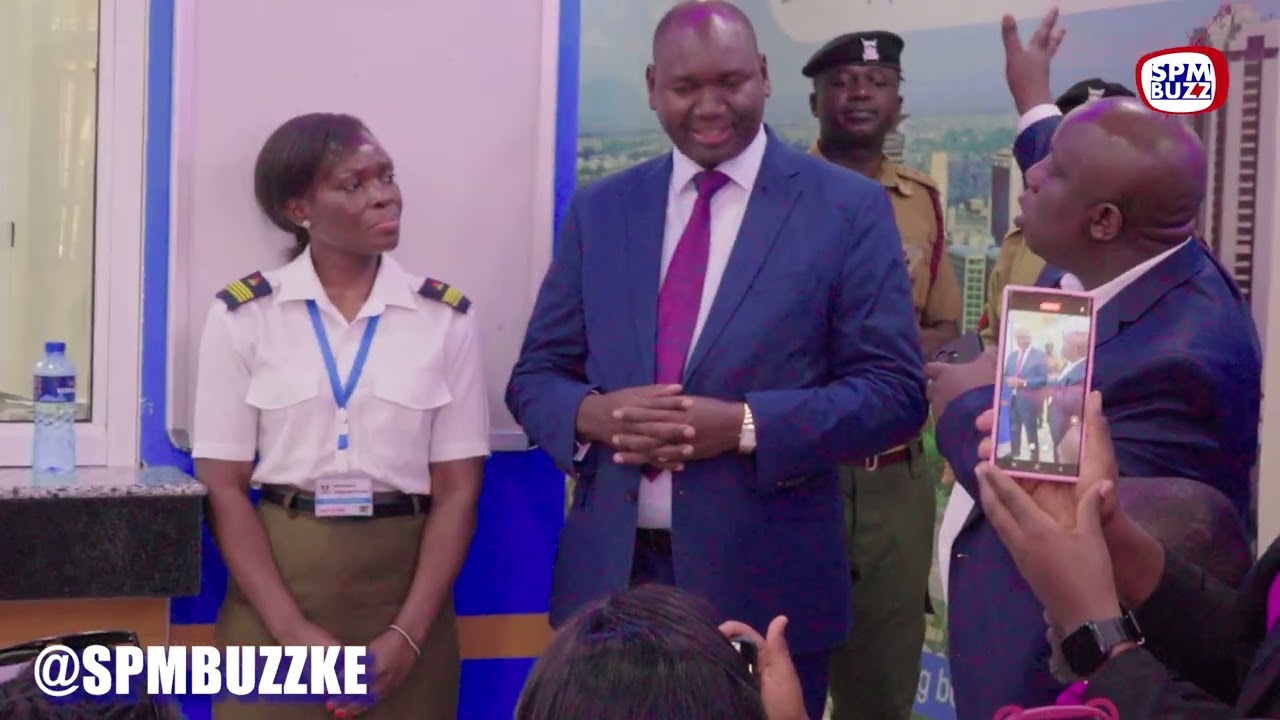 NEW JOB?SEE WHAT HAPPENS AFTER CASSYPOOL MEETS PS BITOK AT THE IMMIGRATION OFFICES.PASSPORTS STACKED