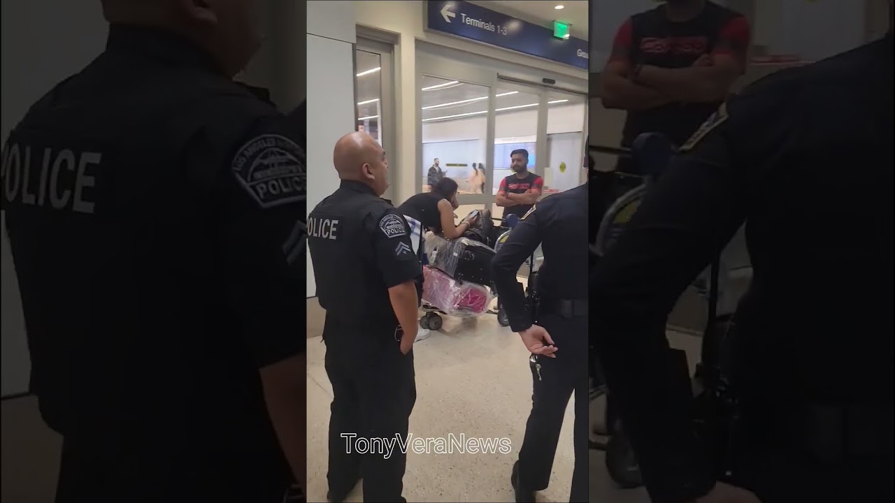 LAX airport police dealing with a woman who is trespassing at LAX airport