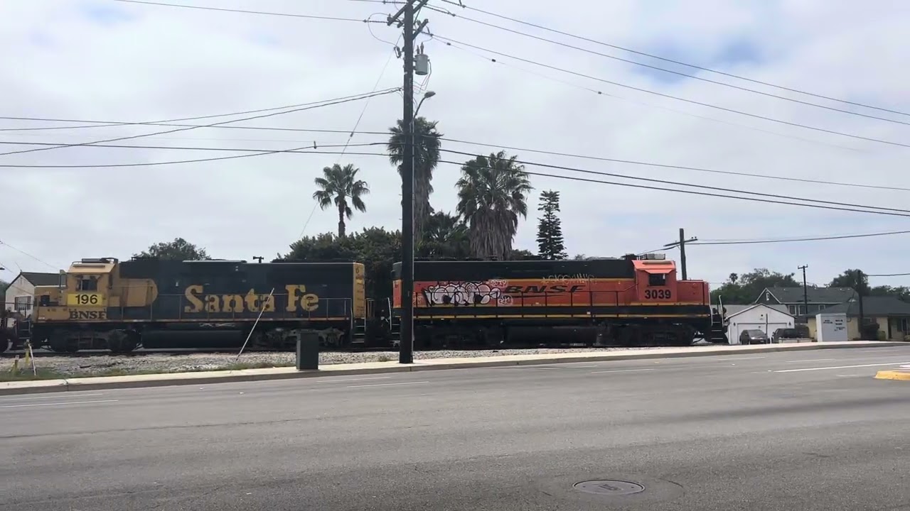BNSF 3039 leads the 748 Job to the Alcoa Yard and El Segundo Yard after passing Sepulveda Blvd