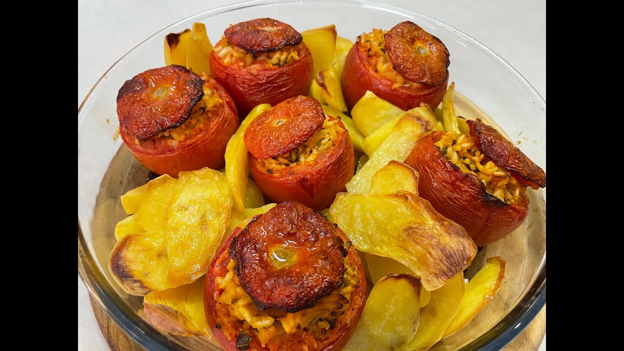 Pomodori ripieni di riso al forno: ricetta spiegata passo per passo.