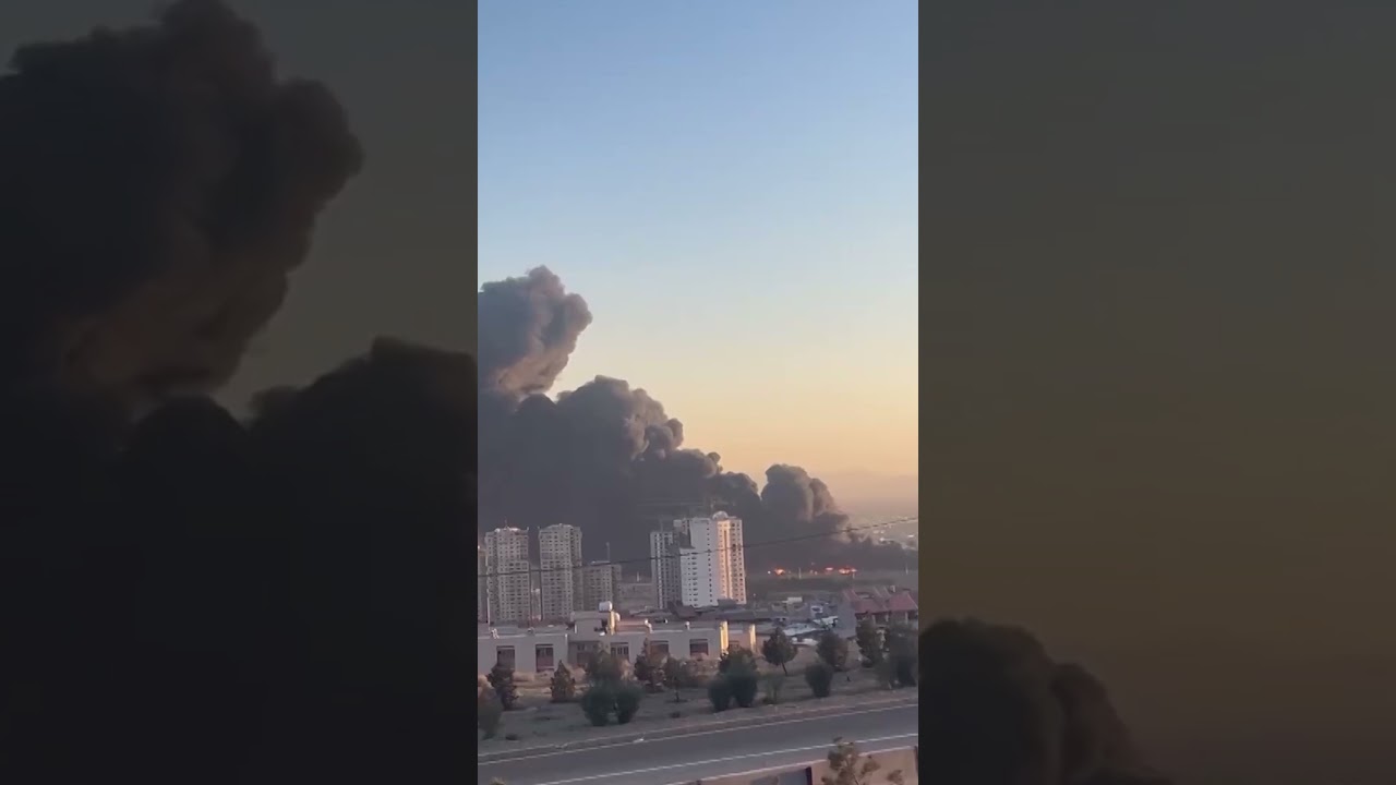 Smoke rises over west Tehran following reported airstrikes