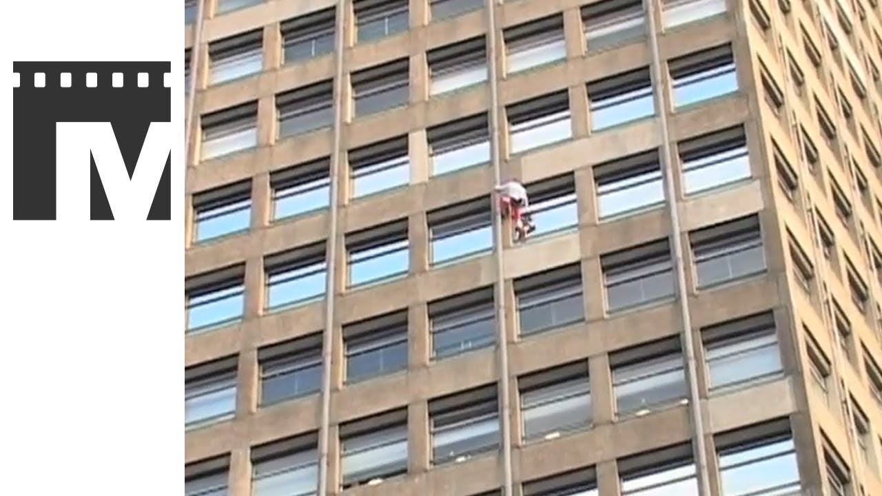 French Spider-man Alain Robert climbs London landmark
