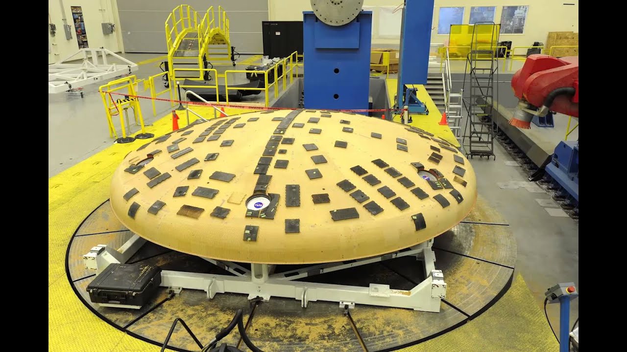 NASA Team at Marshall Removes Charred Orion Heat Shield Surface