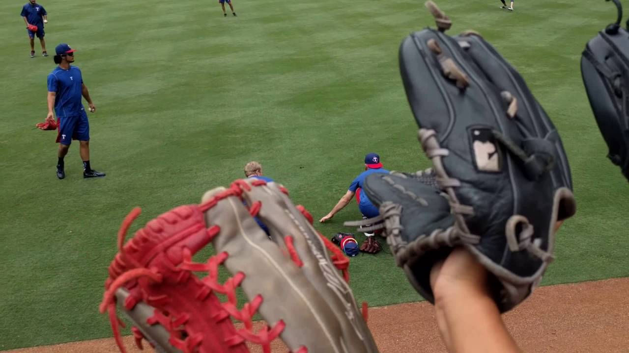 Sam Dyson and Jake Diekman run a race before 8/14/16 game Texas Rangers.
