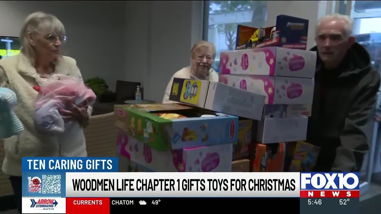 10 Caring Gifts Toy Drive: Woodmen Life Chapter 1, Comic Cowboys make donations