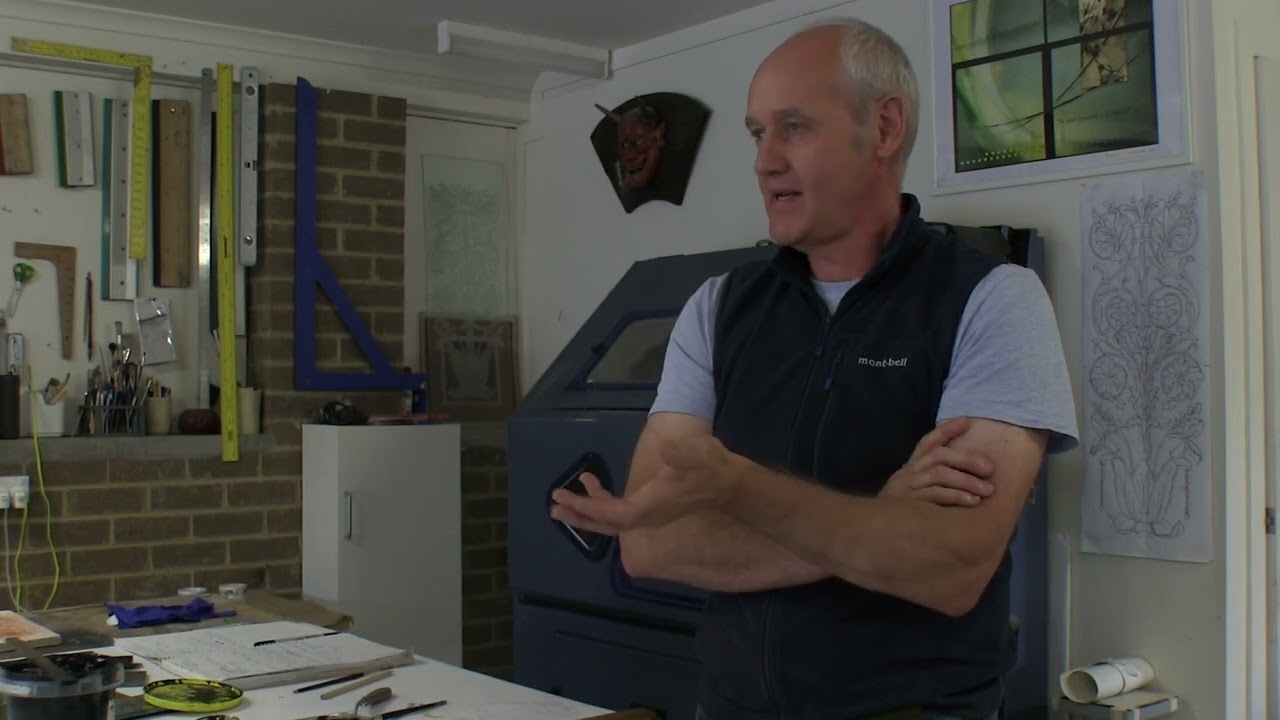 Dr David Smith chats with glass artist Mark Howard