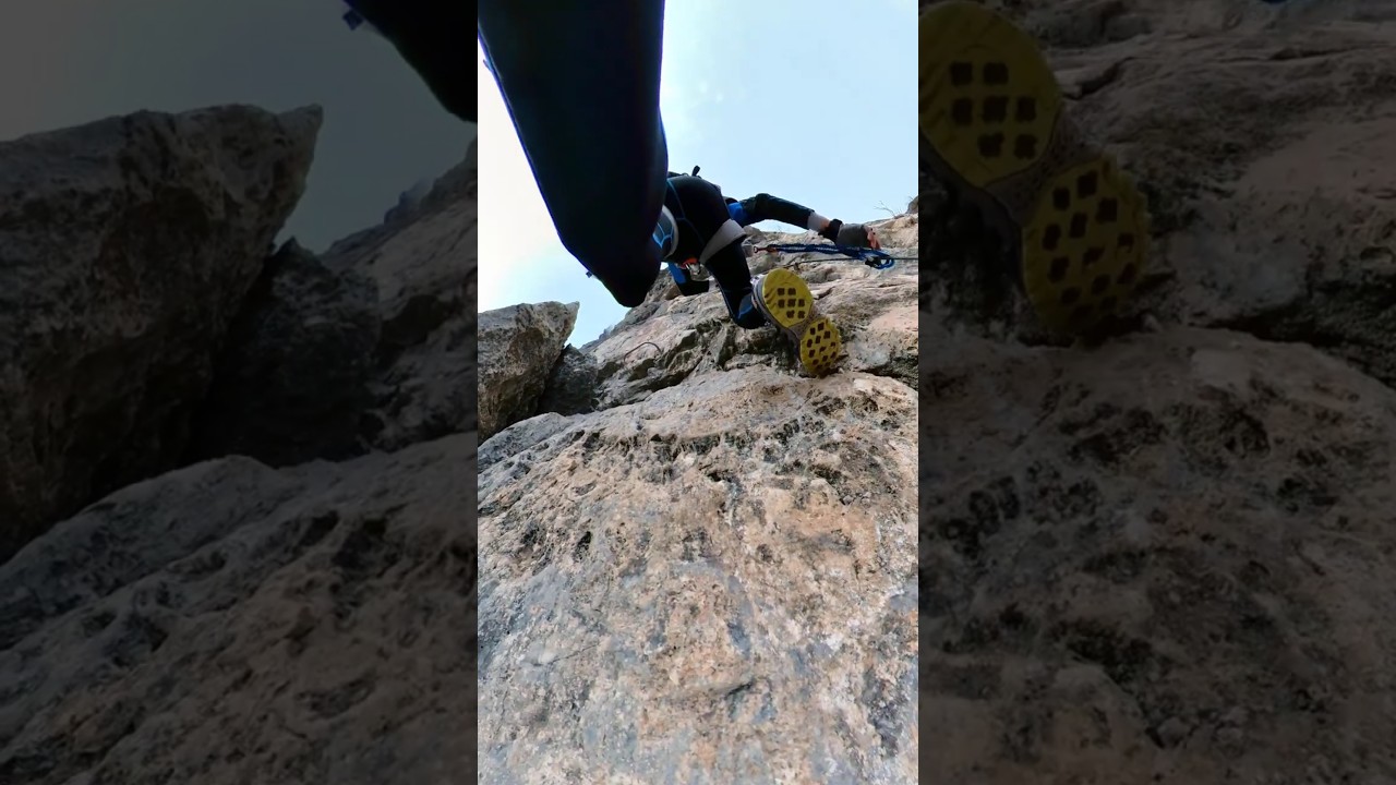 Experience the thrill of climbing sharp ridges on a fixed rope route - 360 camera 4K live footage