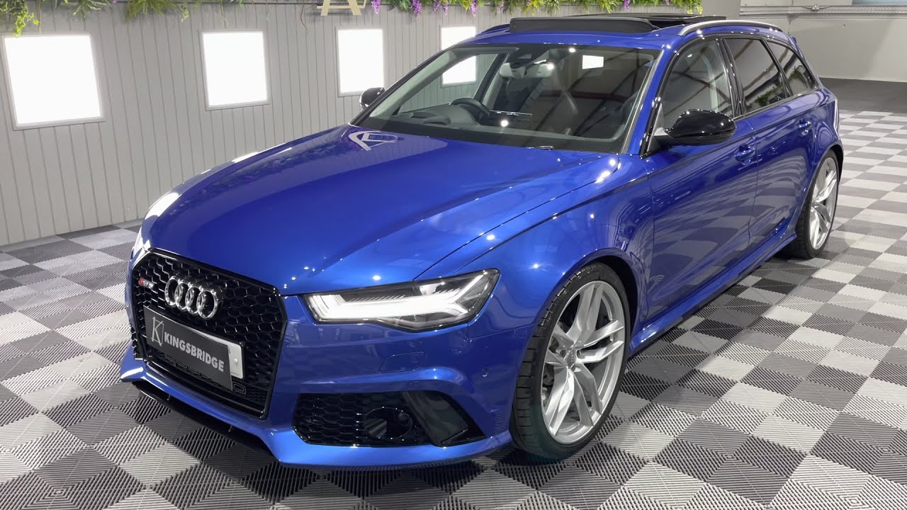 Audi RS6 Avant 2017 года выпуска, цвет Sepang Blue, в полной комплектации, включая панорамную крышу.