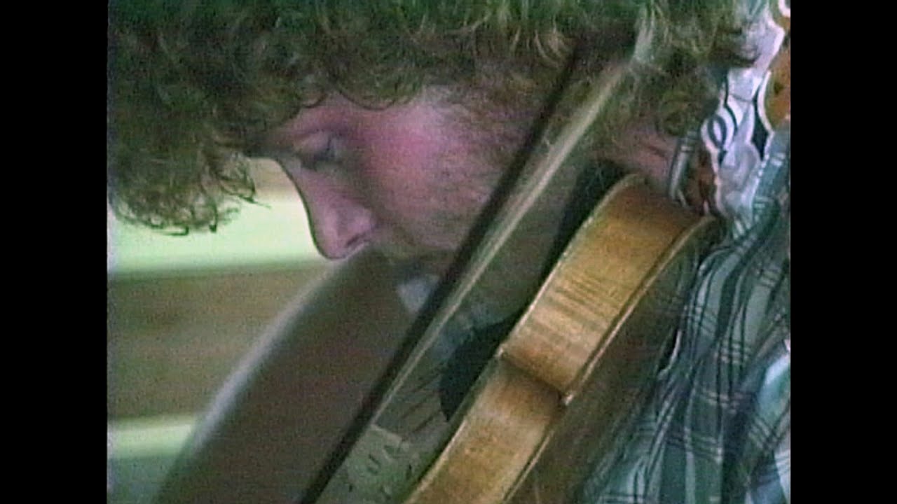 Greg Hooven, Riley Baugus, & Ray Chatfield in a Stables Jam at the Galax Fiddlers Convention, 1988.
