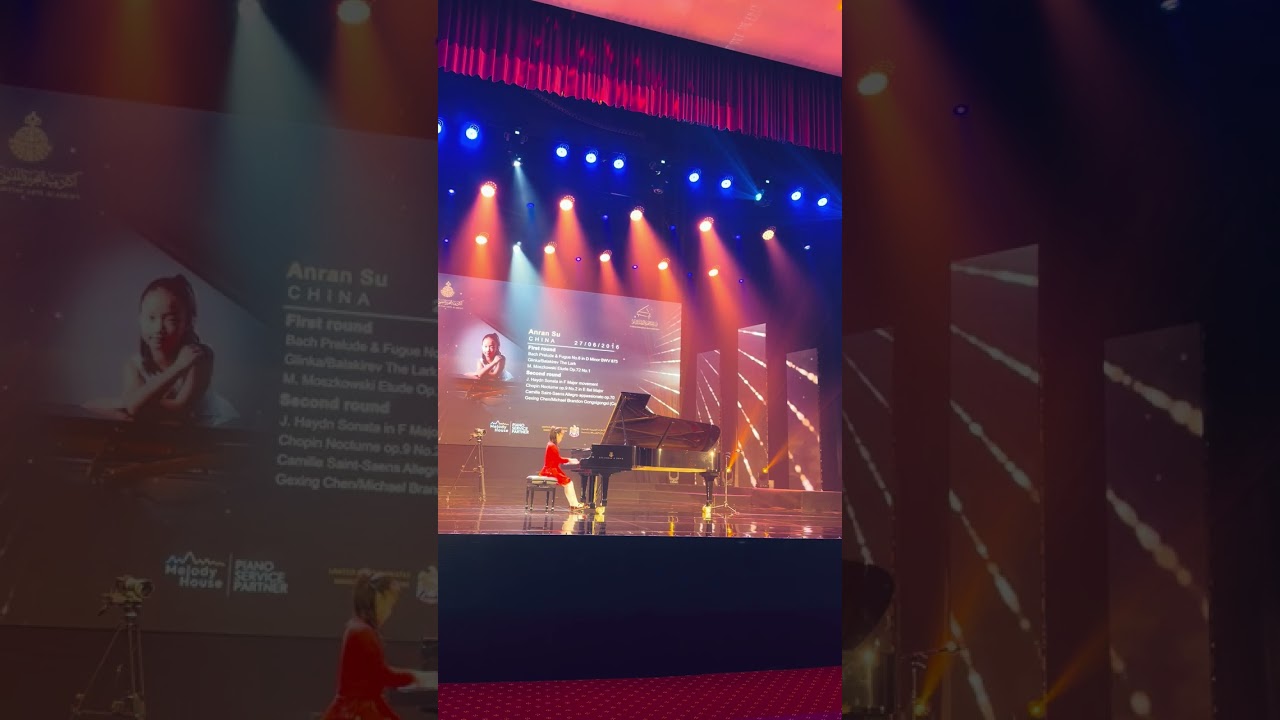 J.Rashkov's students: Anran Su (8, China) at the finals of Fujairah IPC, 2nd prize in her category 