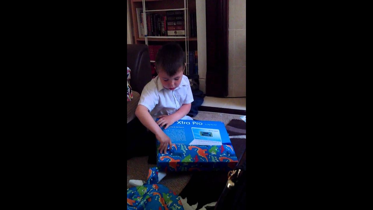 Son opening birthday presents
