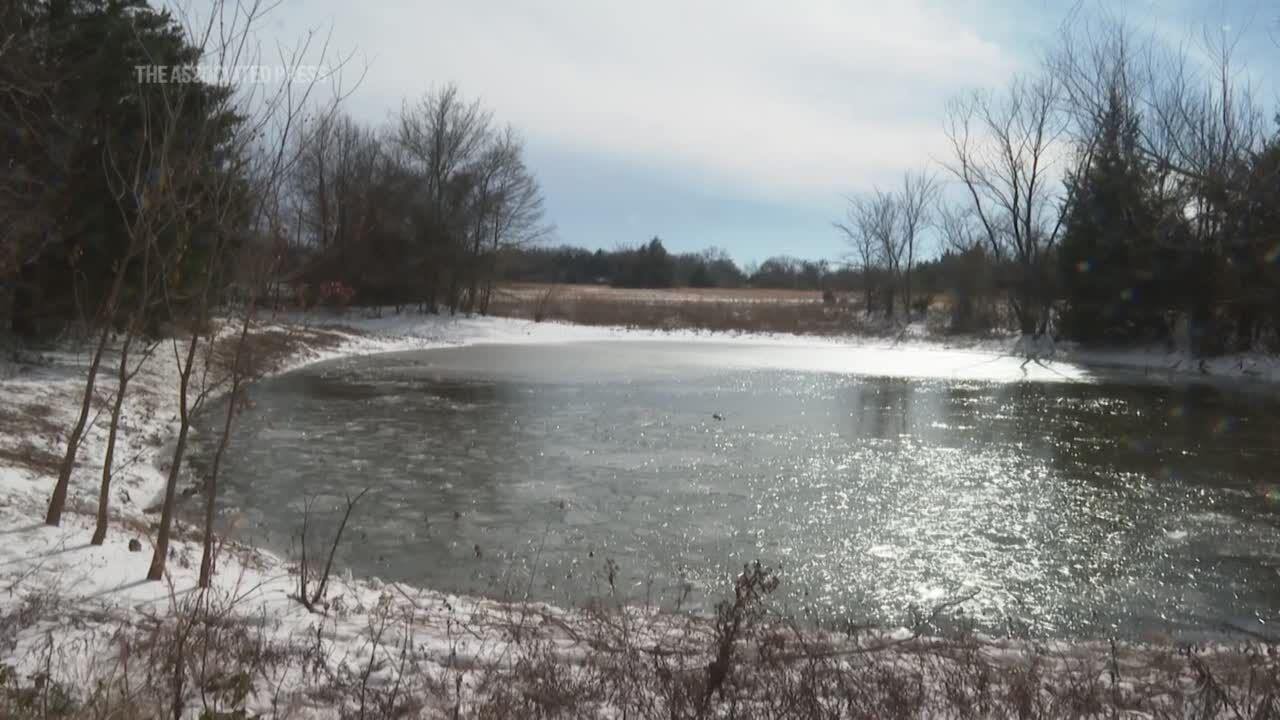 Mom unable to save 3 sons who fell through icy pond