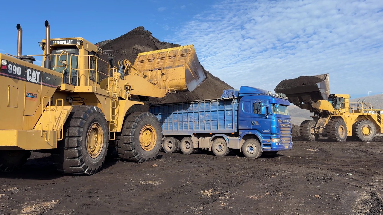 Two Cat 990 Wheel Loaders Loading Coal On Trucks At Massive Mine Deposit  - S.G.M Melidis - Ektor 4K