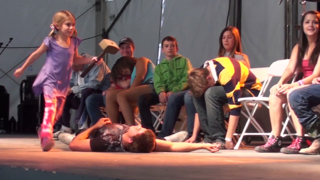 Hypnotist Marc Savard performs with his daughters in hypnosis show