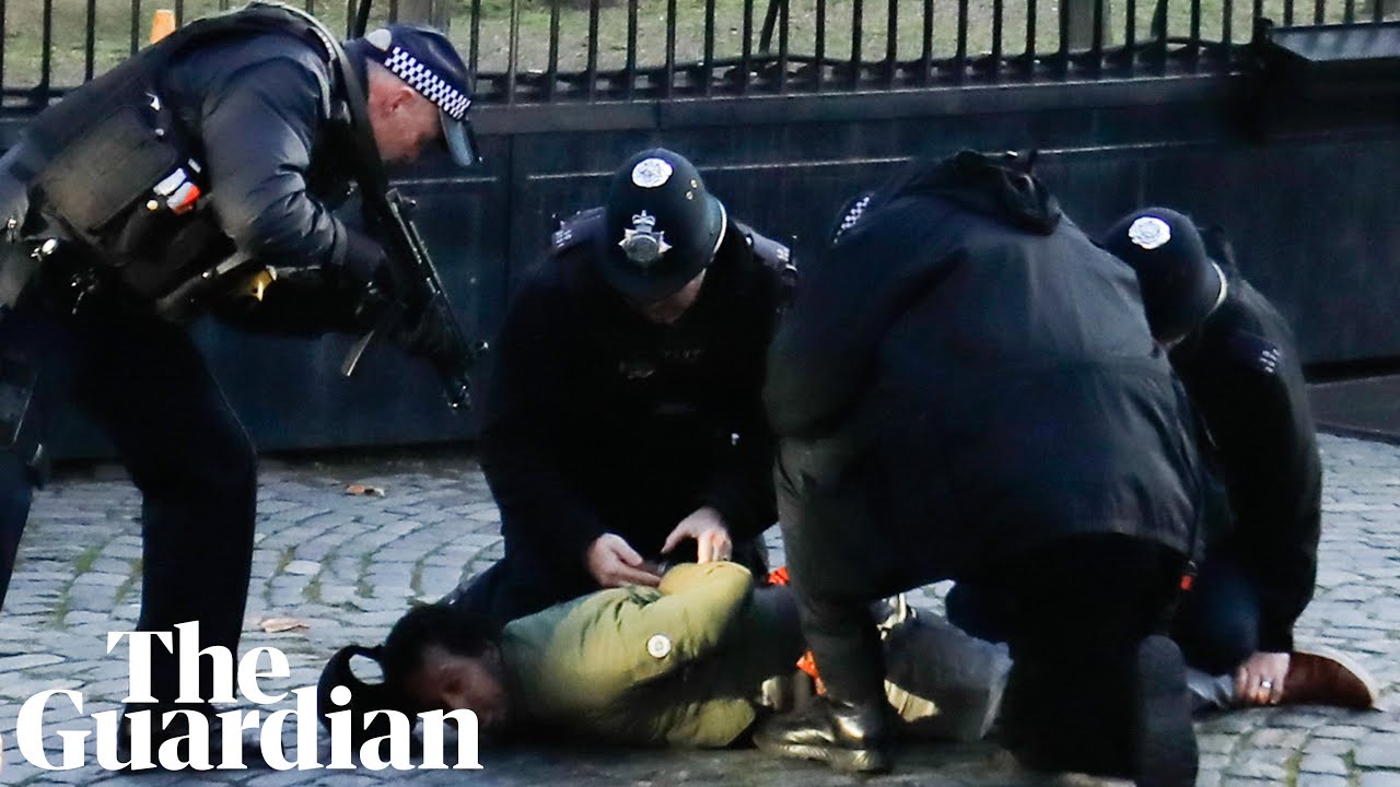Armed police detain man after incident at parliament