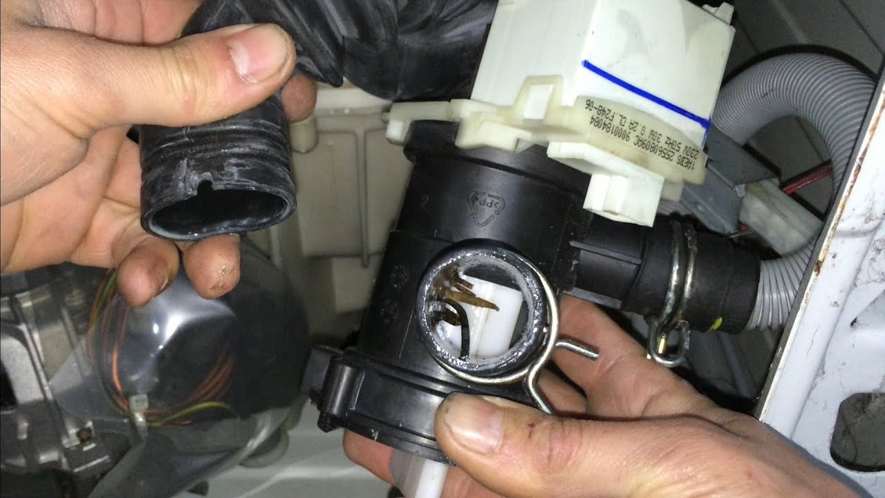 Como limpiar filtro lavadora cuando está obstruido. [Clean the filter washer when it is clogged].