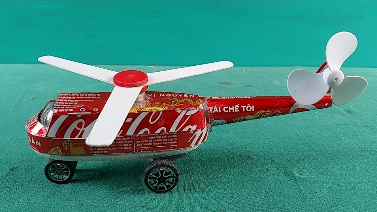 Install ceiling fan blades for homemade toy airplanes from coca-cola cans