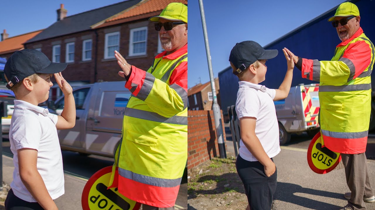 School lollipop man told he can't 'high five
