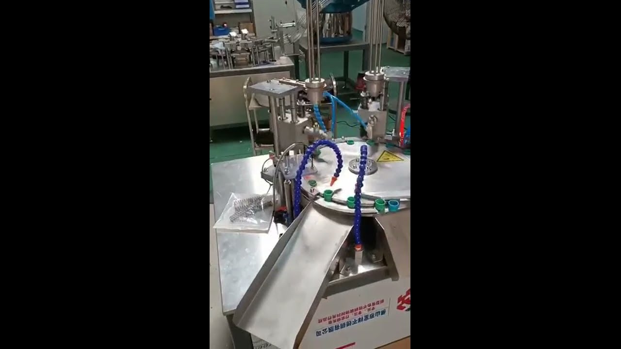 Automatic two head bottle cap wadding machine