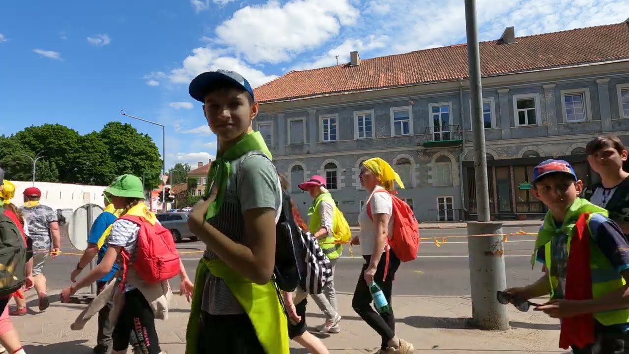 Vilnius Vibes: Chilling and People Watching at a Bus Stop with Delightful Children's Singing