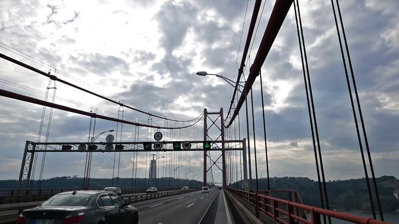 Driving Over April 25th Bridge Lisbon And Visiting The Platform