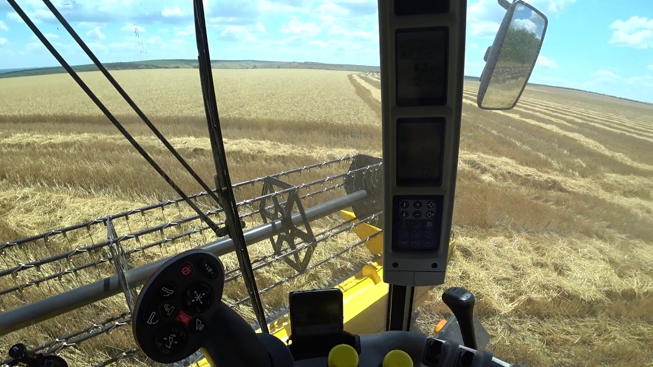 New Holland TC 5.90 - подробности эксплуатации.