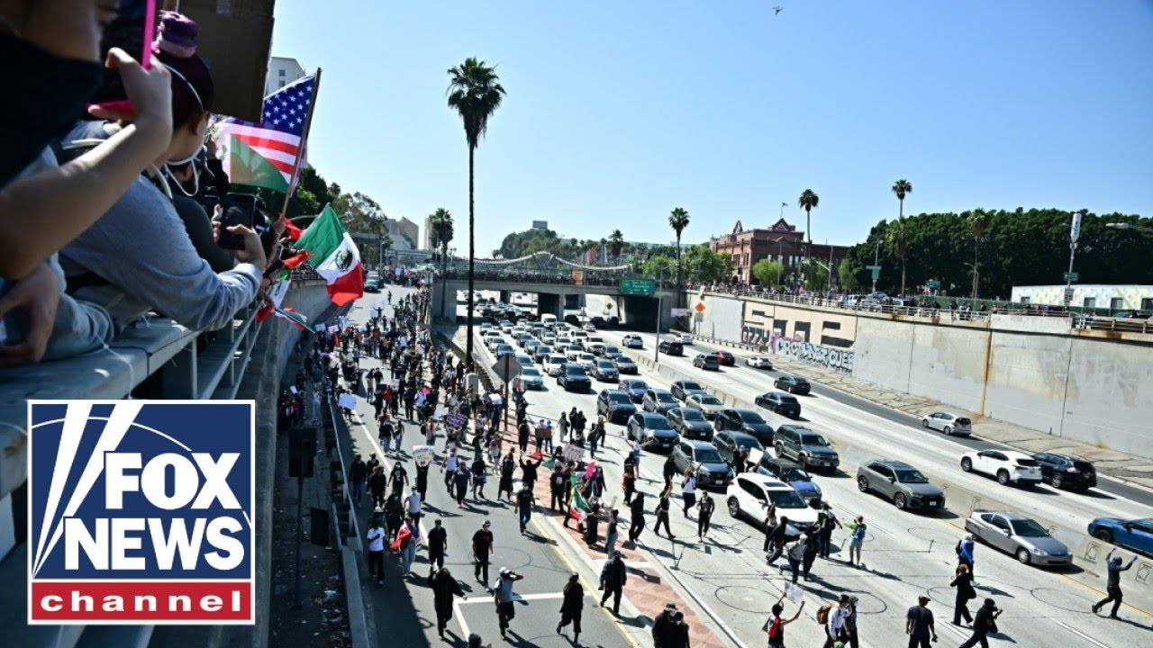 FREEWAY TAKEOVER: Los Angeles rioters take to major highway