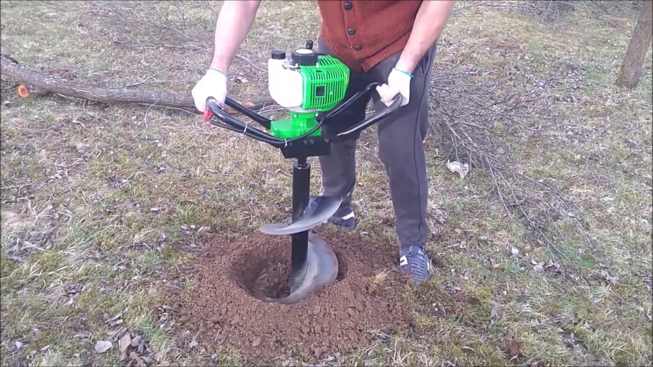 Motoburghiu pentru sapat gropi Progarden; Foreza de pamant in sol cu pietre; post hole digger