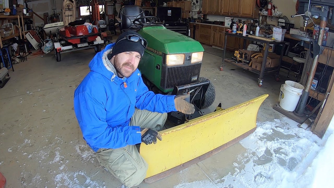 Plowing Snow with Deere 425 Garden Tractor