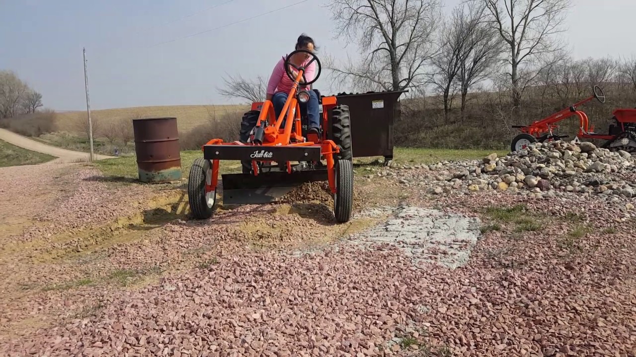 Tuff-bilt Tractor using the Grader Blade