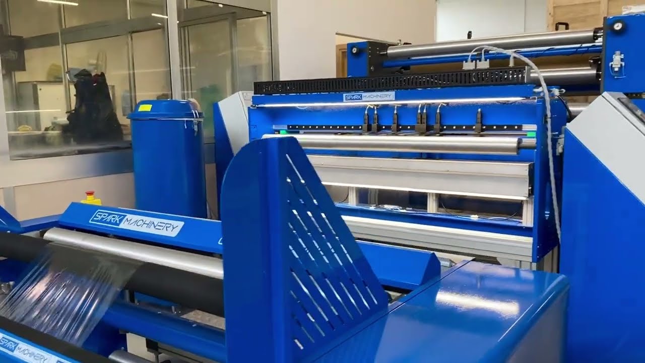 Unwinder-Rewinder with both a micro and a macro perforator for plastic film