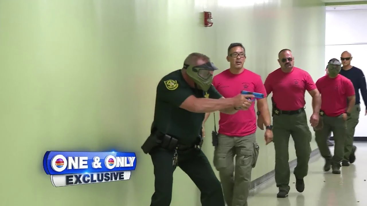 Law enforcement officials undergo active shooter training at Cypress Bay High School