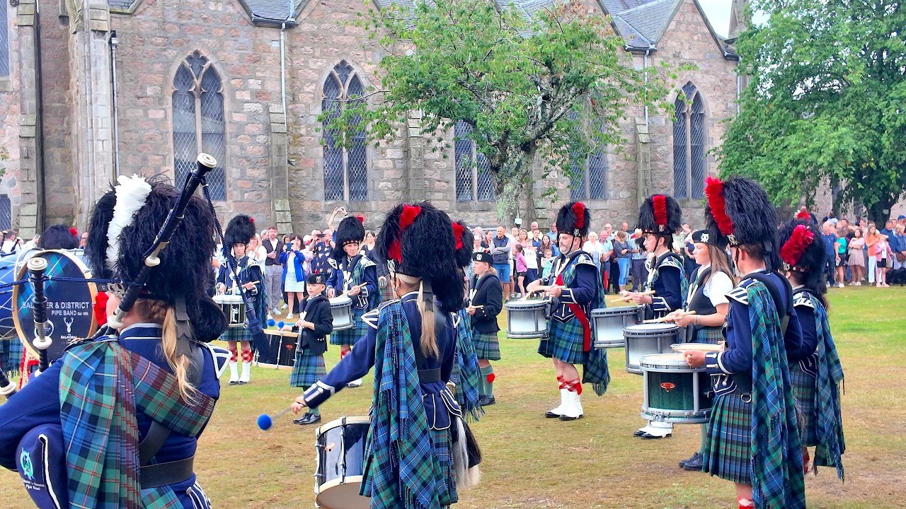 Ballater.Pipe Band playing John Campbell during Beating Retreat after 2025 Ballater Highland Games