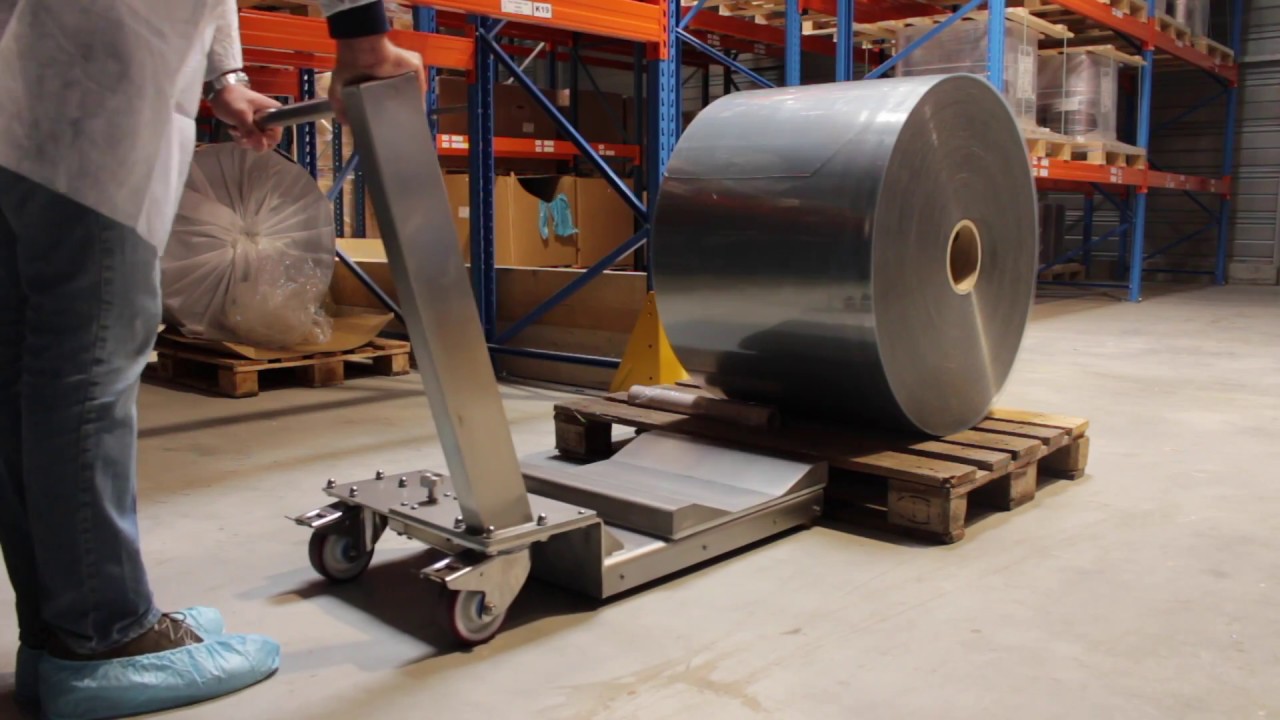 Devices for thermoforming and packaging machines Reel Handling Trolley With Rotating Unit