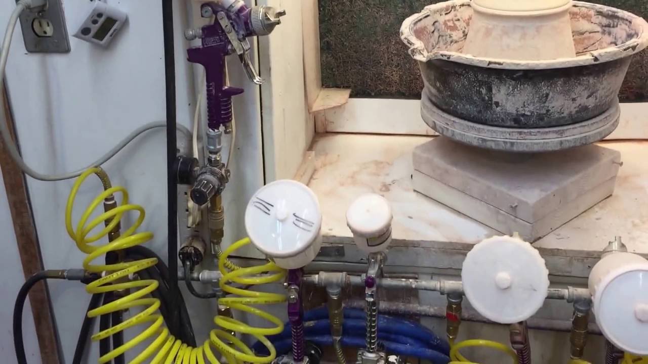 Tim Havens making pottery spray booth