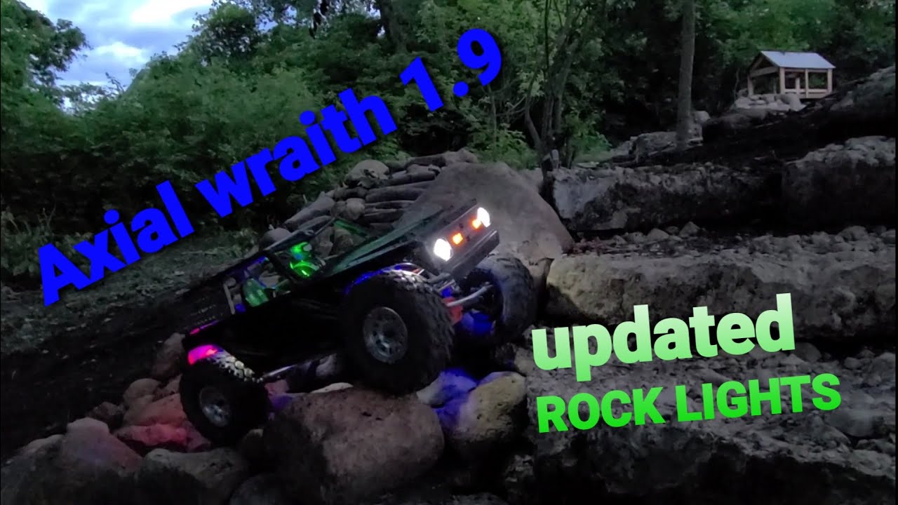 Axial Wraith 1.9 showing off updated Rock Lights on an evening crawl