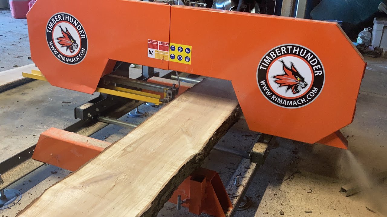 Rima rs31g sawmill slicing up some maple slabs.