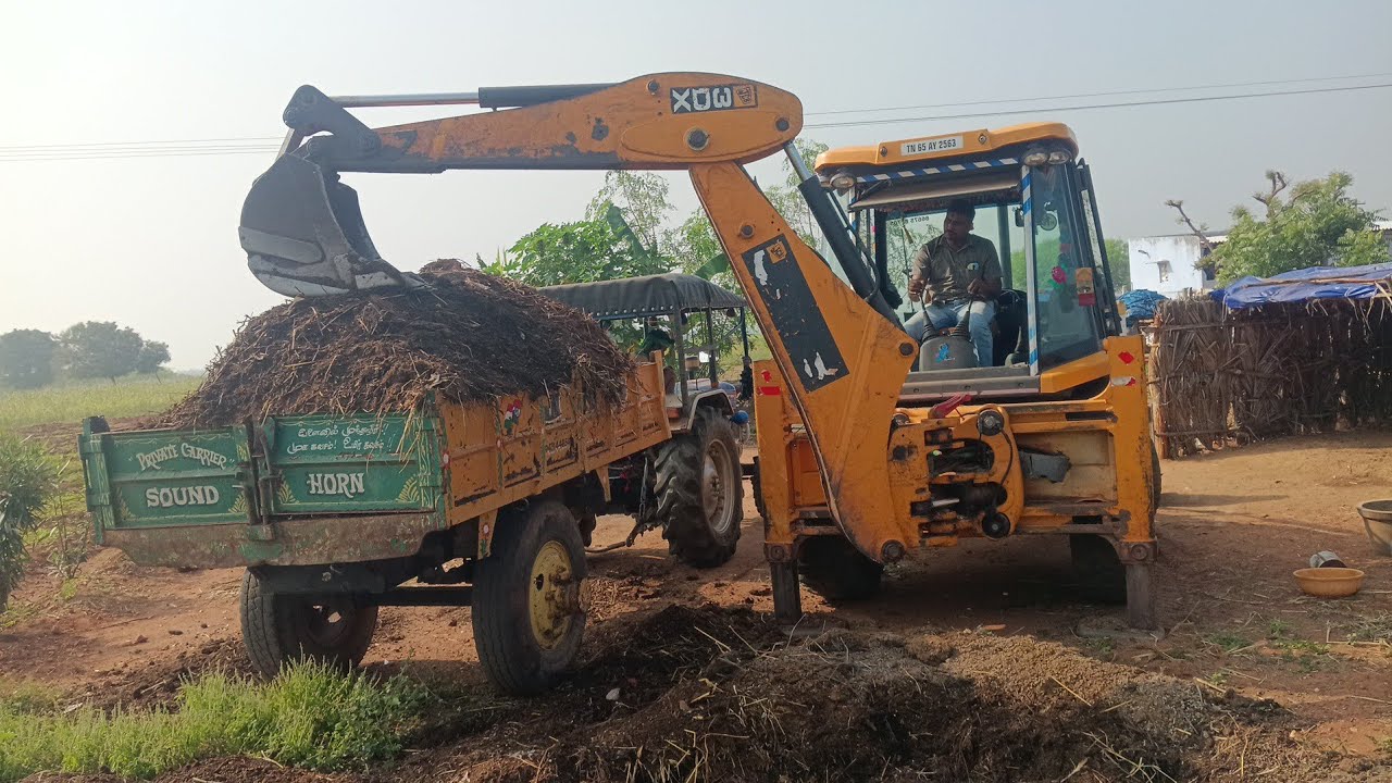 Mahindra and powertrac tracter trolley performance in Goat dung loding 