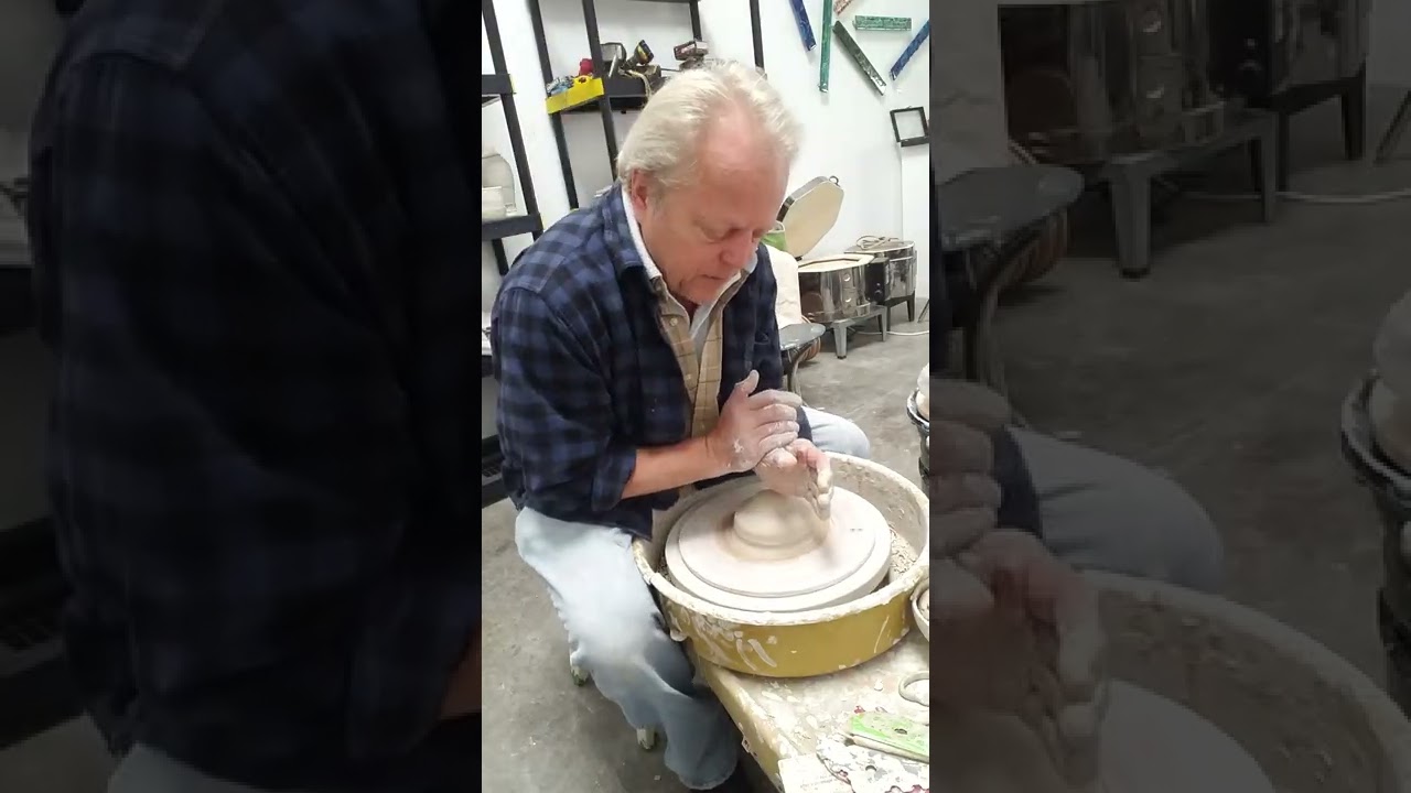 centering clay with one hand