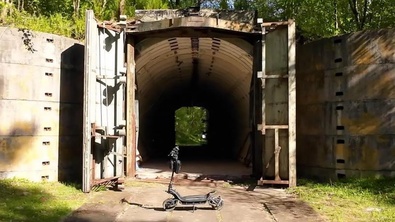 Getting through steep forest hills to see old bunkers on Nami Burn-e Max scooter
