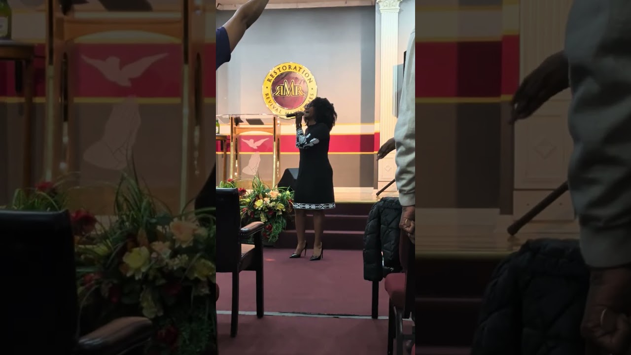 Pam singing for uncle - Apostle R.D. Moss