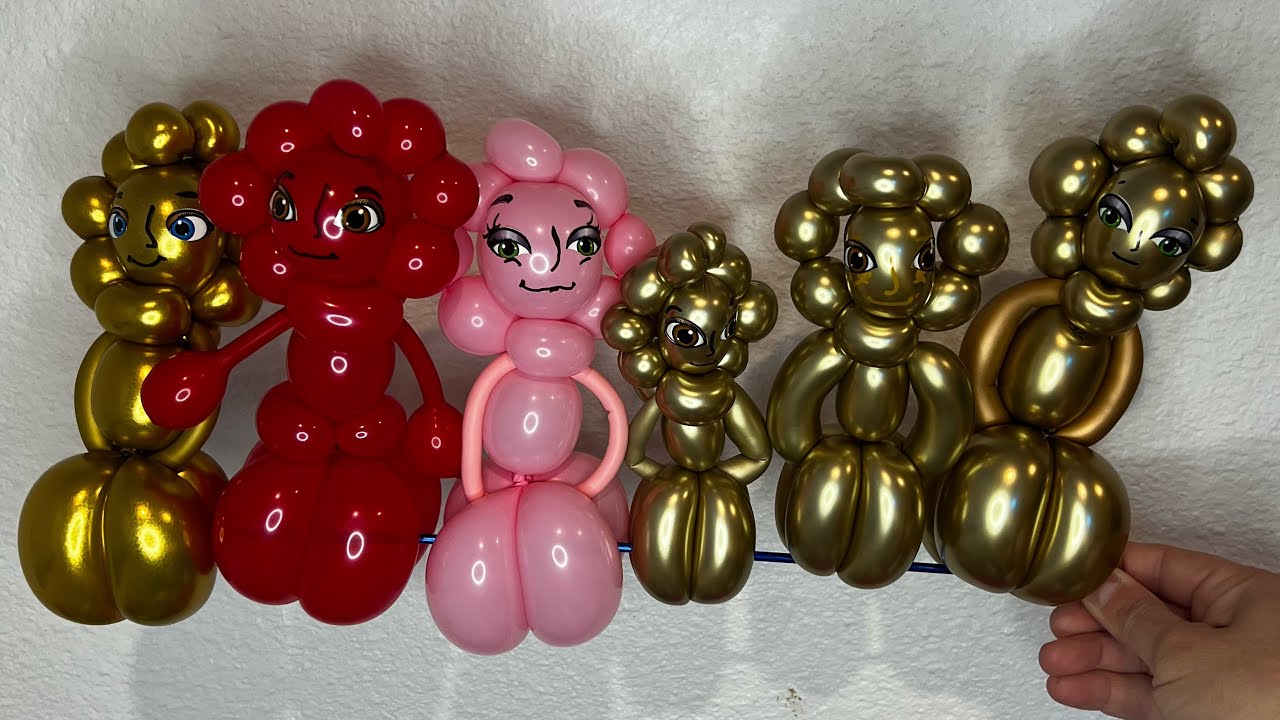 Mujer dorada con un globo tutorial de Globoflexia . Muñeca 