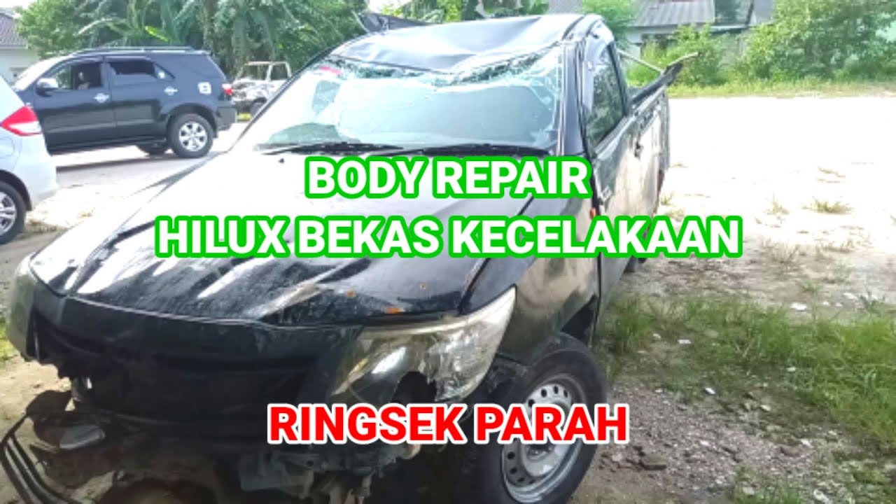 Body repair mobil hilux bekas kecelakaan