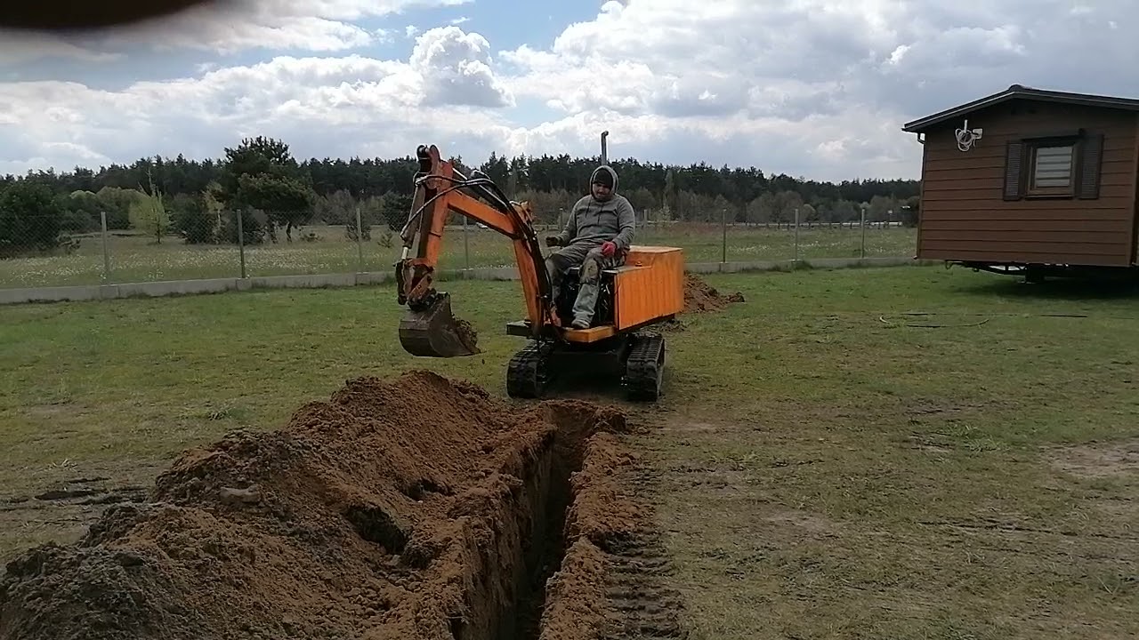 Minikoparka SAM  wykop pod wodę