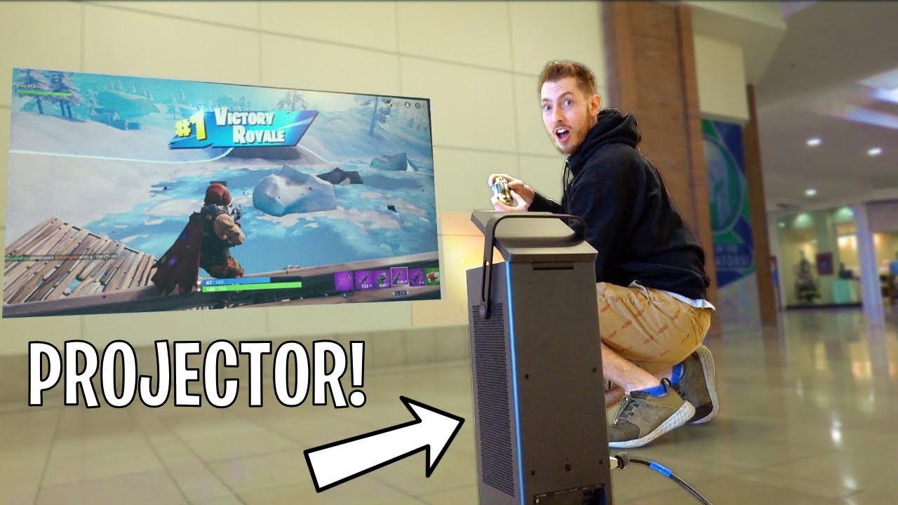 PLAYING FORTNITE ON PROJECTOR IN STORES!