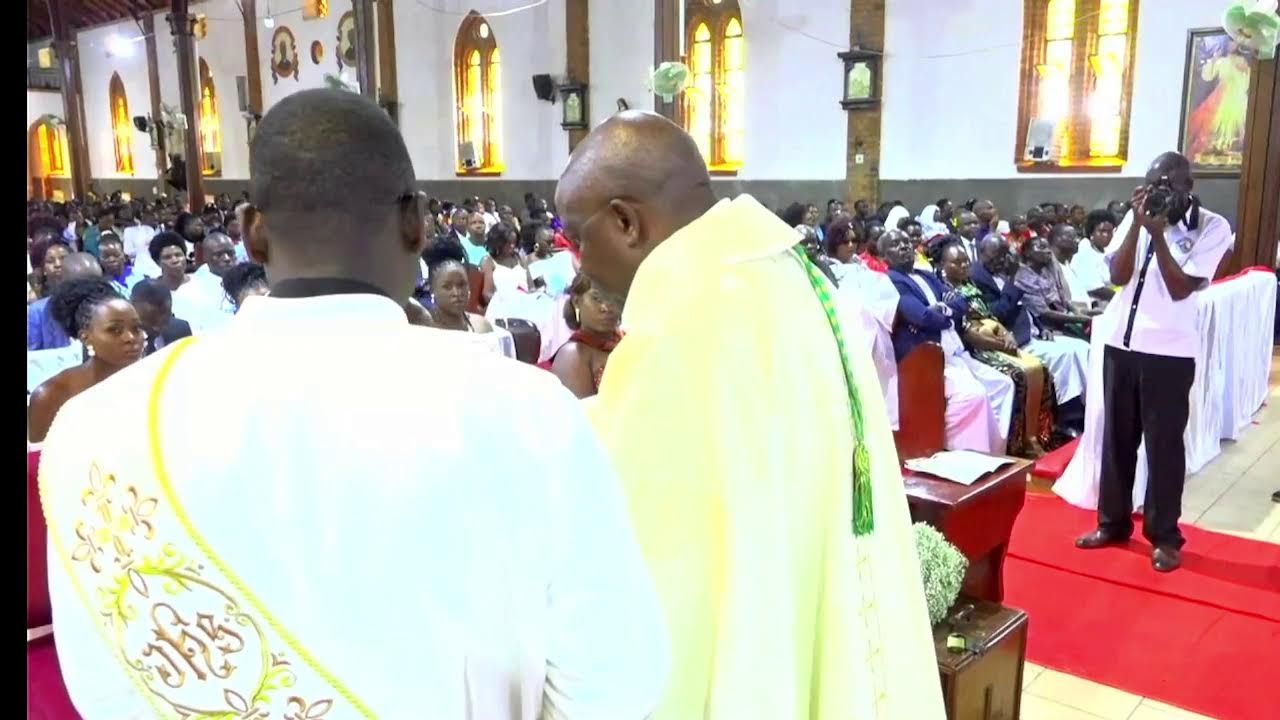 MULONGO KATO DMIAN AND IMMACURATE  WEDDING DAY