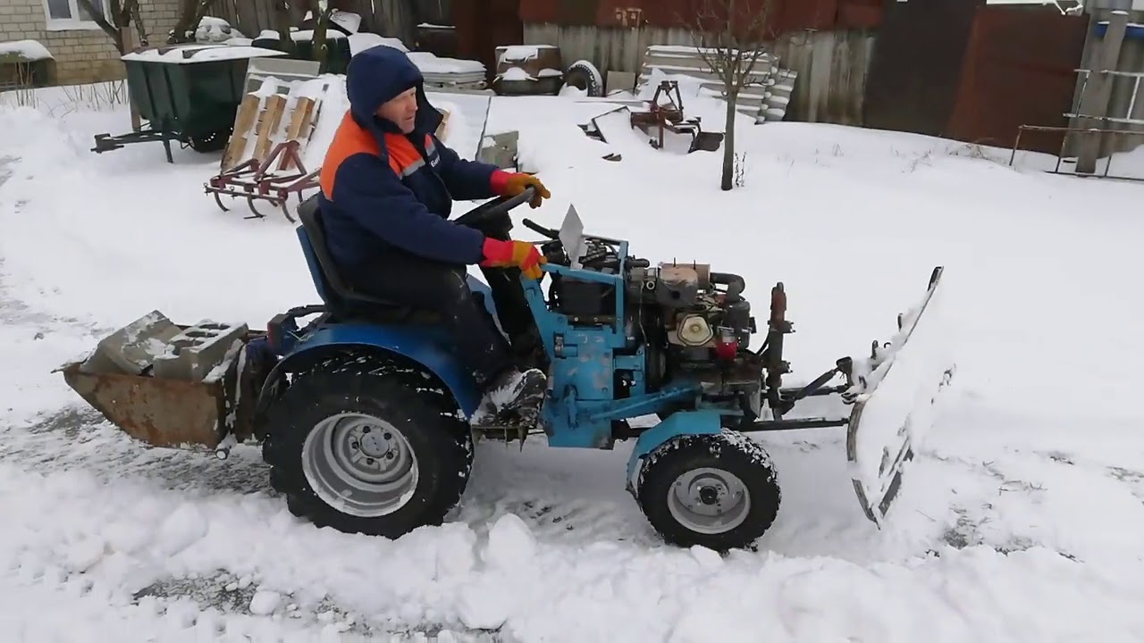 Уборка снега минитрактором: испытание самодельного отвала